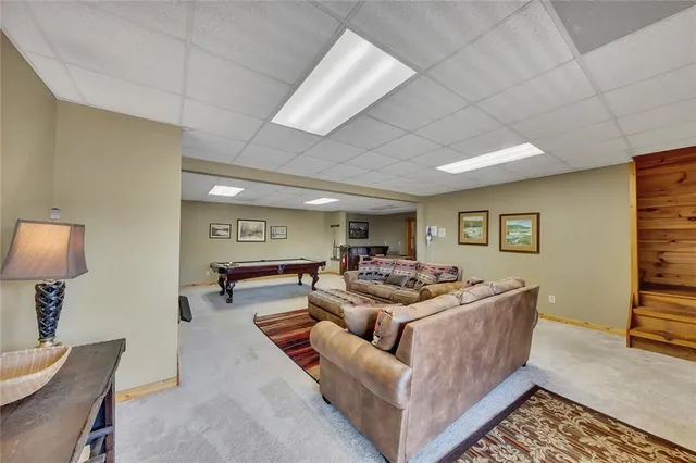 a living room with furniture and a table