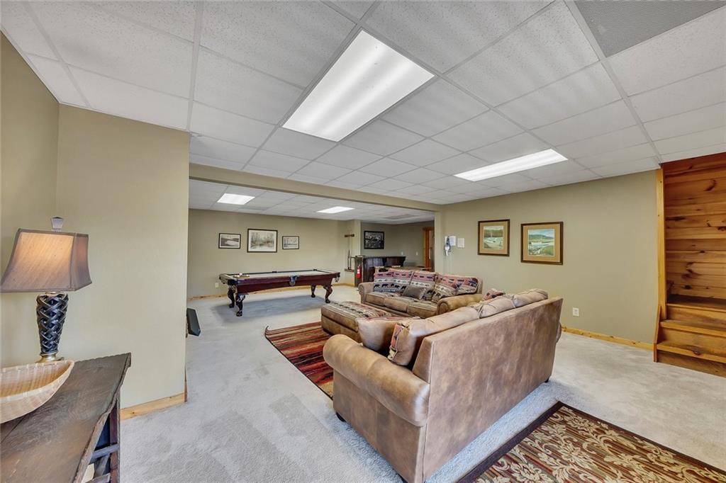 499 Raven Ridge Circle Mineral Bluff, GA 30559 - Photo 24 of 43 a living room with furniture and a table