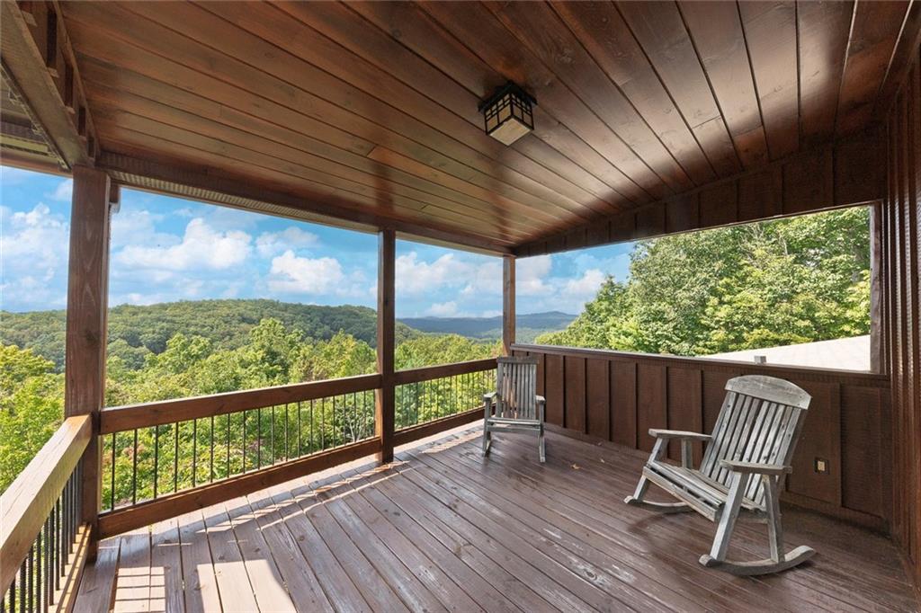 499 Raven Ridge Circle Mineral Bluff, GA 30559 - Photo 31 of 43 a view of a chairs in balcony