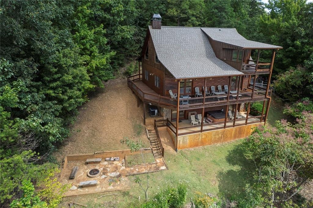 499 Raven Ridge Circle Mineral Bluff, GA 30559 - Photo 40 of 43 an aerial view of a house with swimming pool garden view and deck