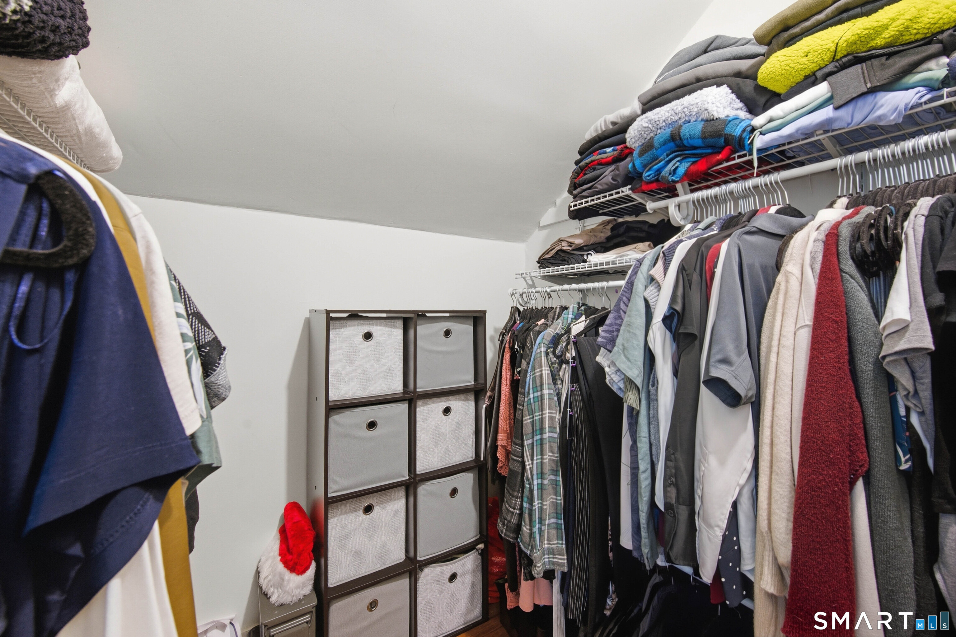 120 May Street Naugatuck, CT 06770 - Photo 27 of 31 a view of walk in closet with clothes and shoes
