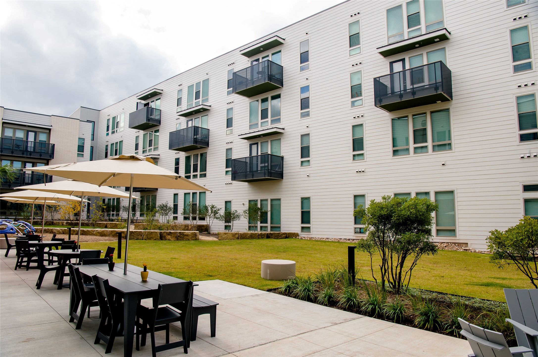5310 Helen Street, Unit 2BR Austin, TX 78751 - Photo 8 of 22 a view of a building with garden and sitting area