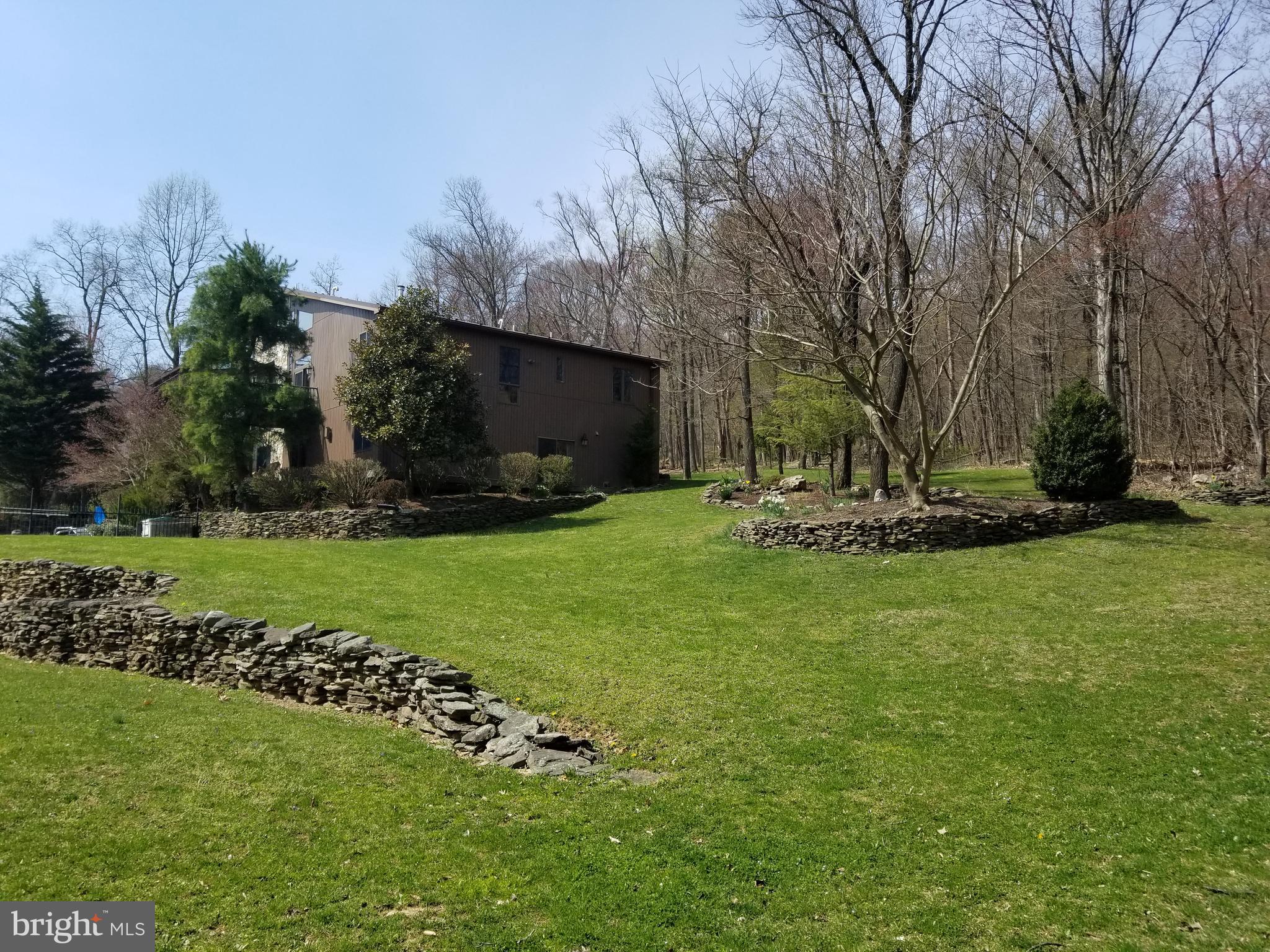 4729 Mountain View Road Harrisburg, PA 17110 - Photo 84 of 113 Side of home near sport court and pond