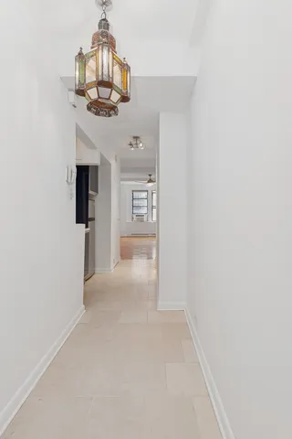 a view of a kitchen from a dining room