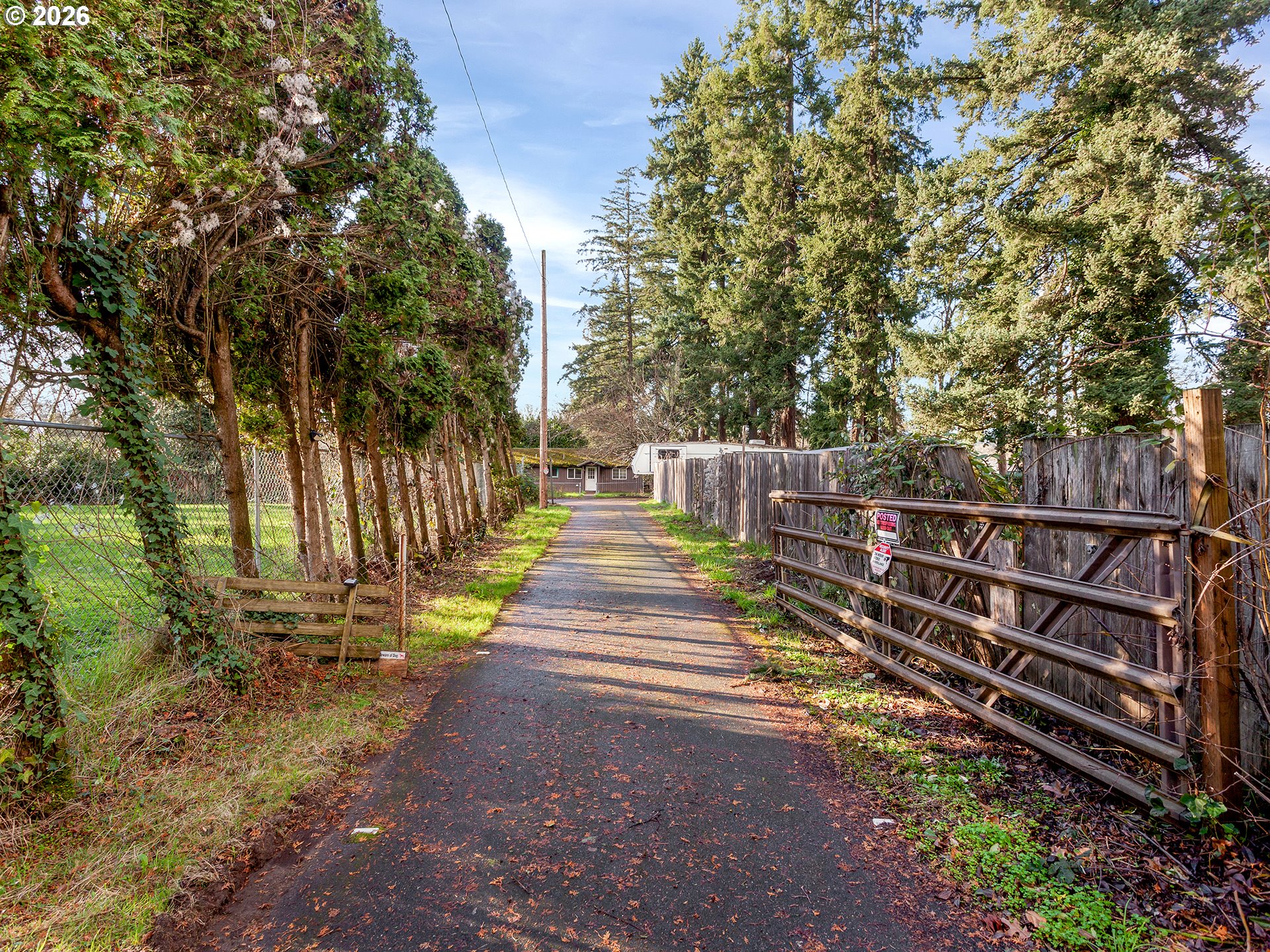 14601 Southeast River Road Milwaukie, OR 97267 - Photo 2 of 28 a view of street with wooden fence