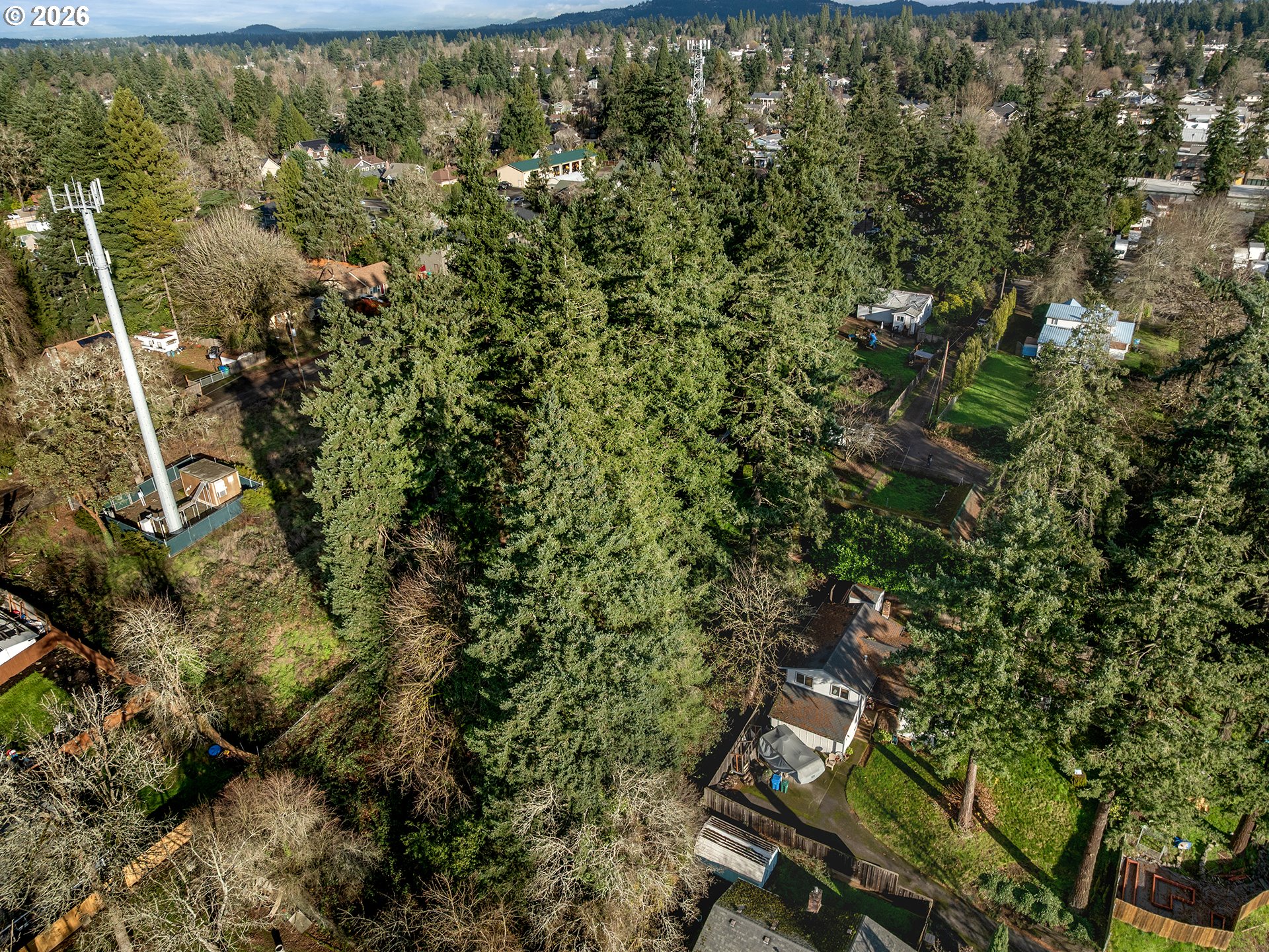 14601 Southeast River Road Milwaukie, OR 97267 - Photo 24 of 28 an aerial view of a house with lots of trees