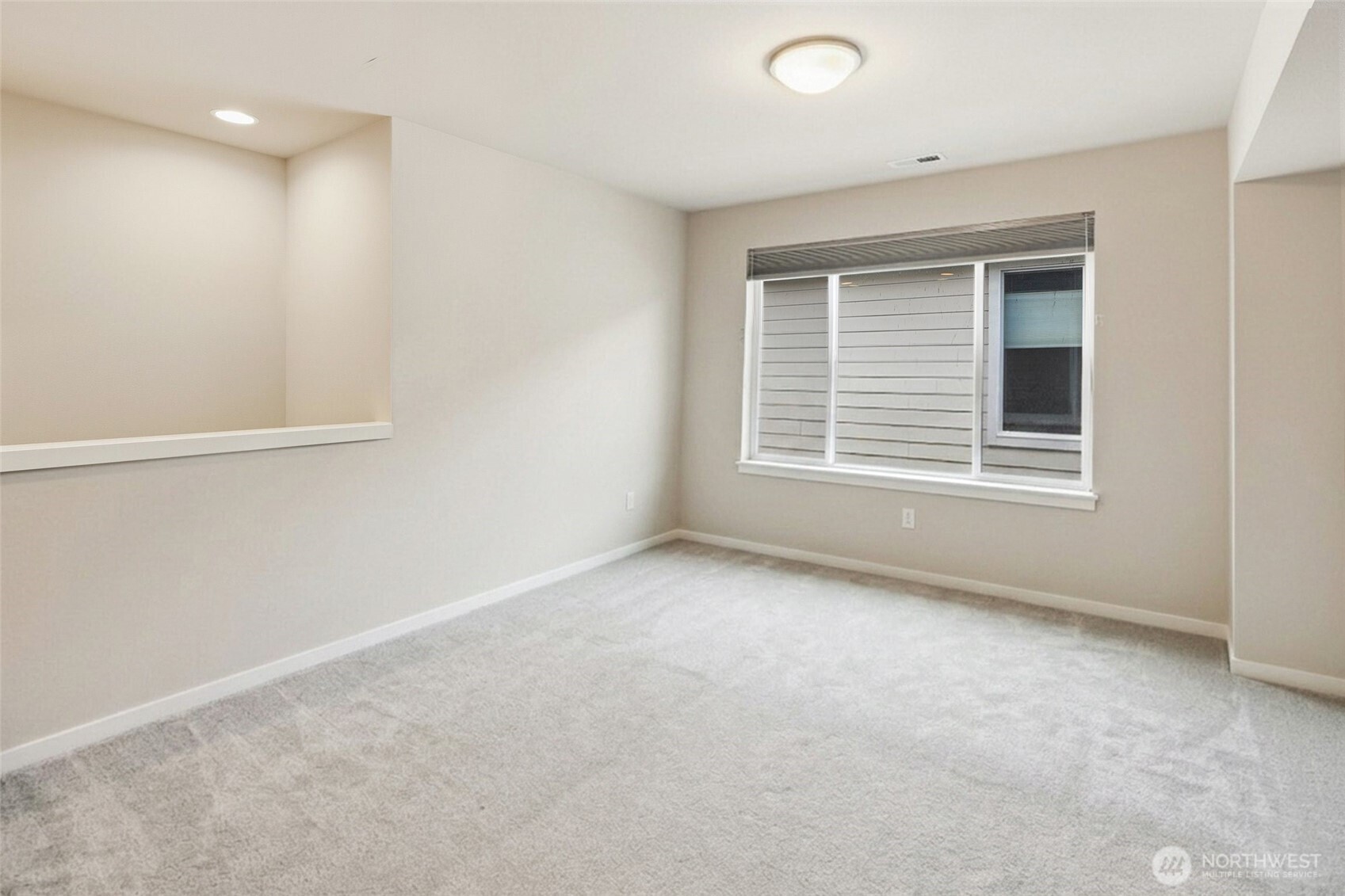 17227 39th Drive Southeast Bothell, WA 98012 - Photo 12 of 22 a view of an empty room with a window