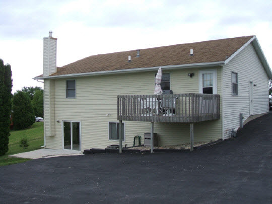 174 Lake Summerset Road Lake Summerset, IL 61019 - Photo 7 of 8 a view of a house with roof deck