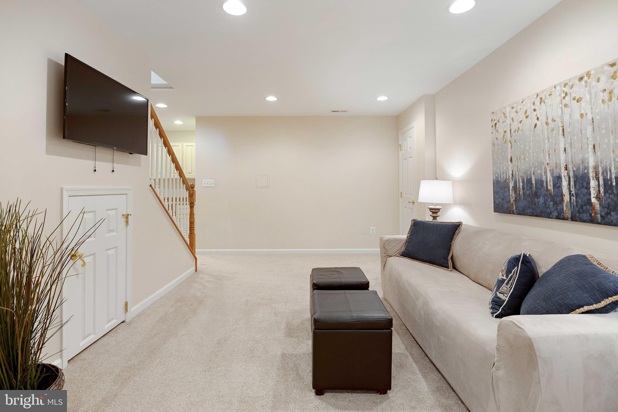 1402 Hunting Wood Road Annapolis, MD 21403 - Photo 26 of 48 TV area in lower level