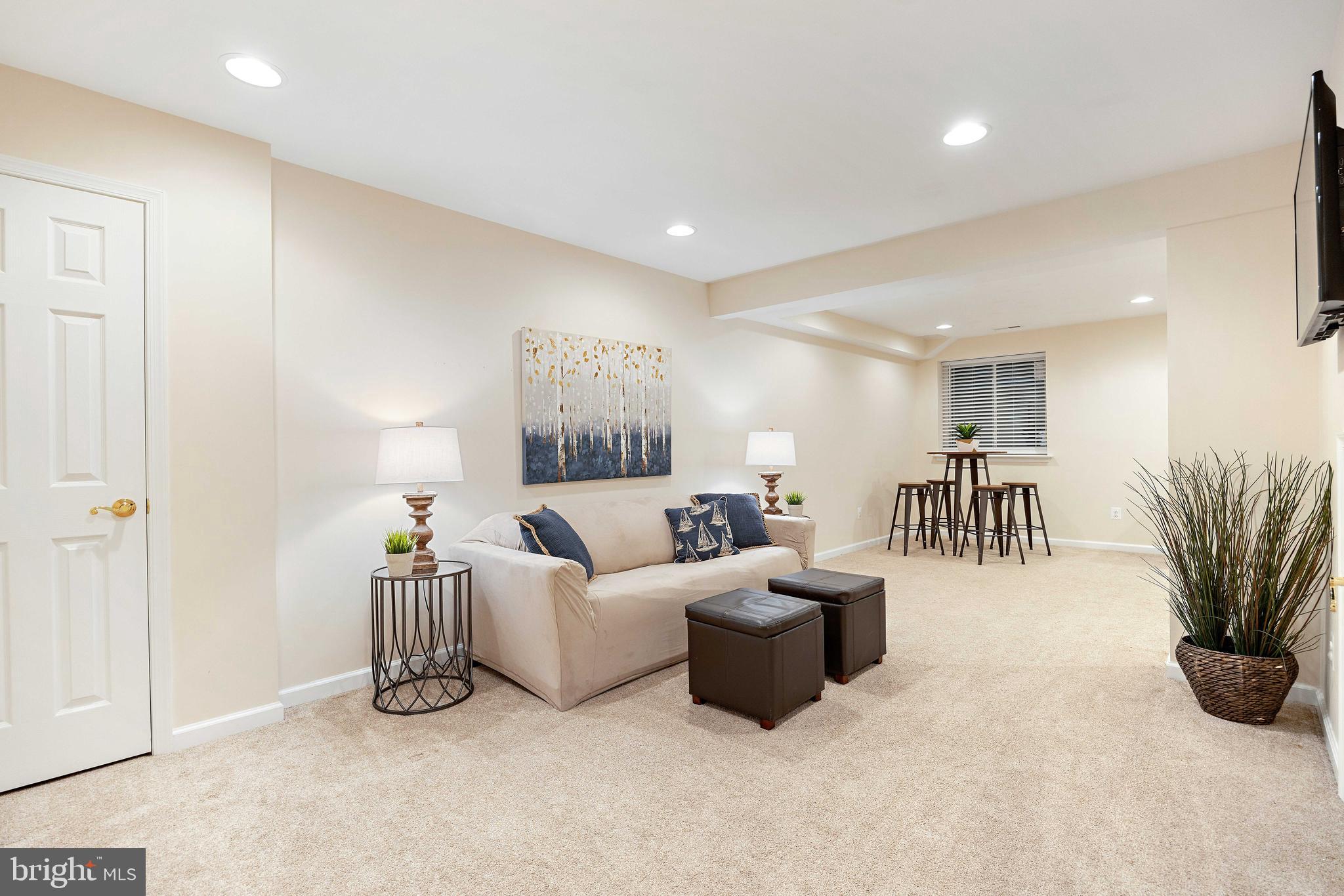 1402 Hunting Wood Road Annapolis, MD 21403 - Photo 27 of 48 Lower level TV and rec room