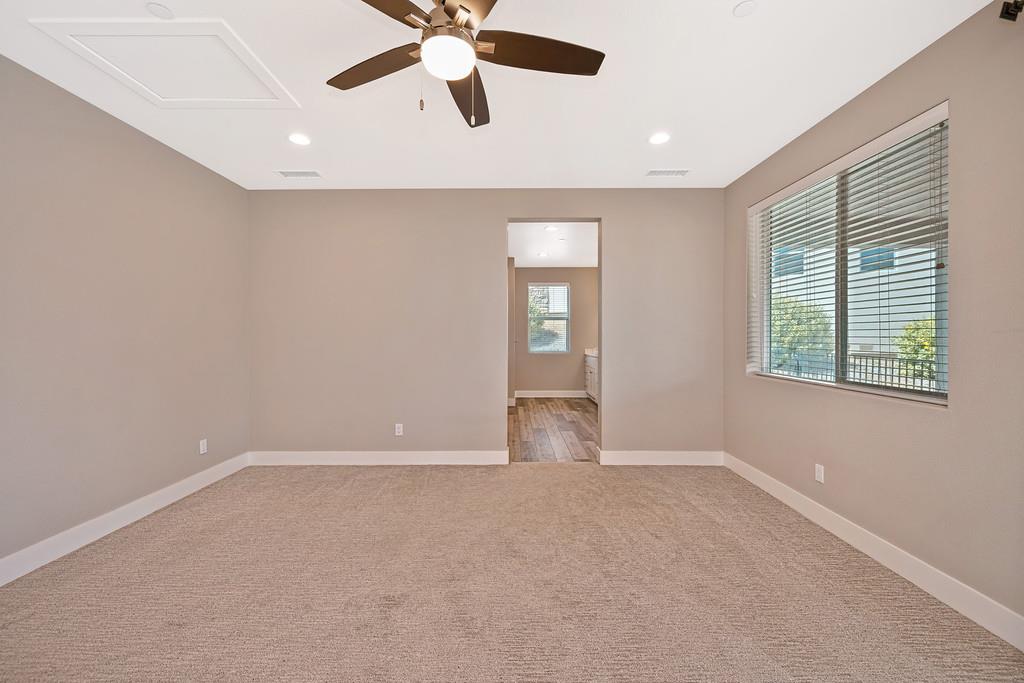 504 Chase Court Colfax, CA 95713 - Photo 51 of 94 an empty room with windows and fan