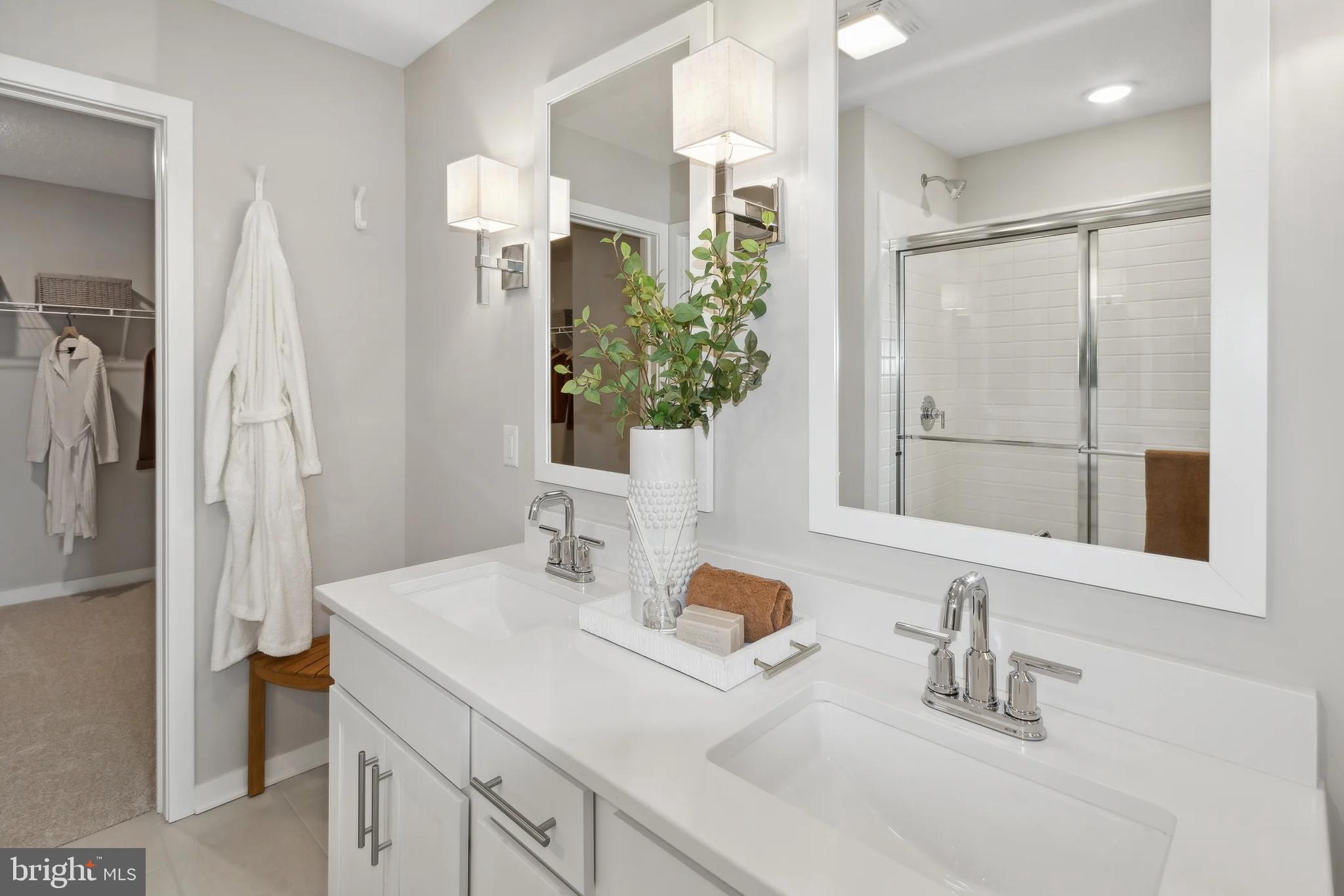 94 Thornton Avenue Ranson, WV 25438 - Photo 13 of 24 a bathroom with a sink and a mirror