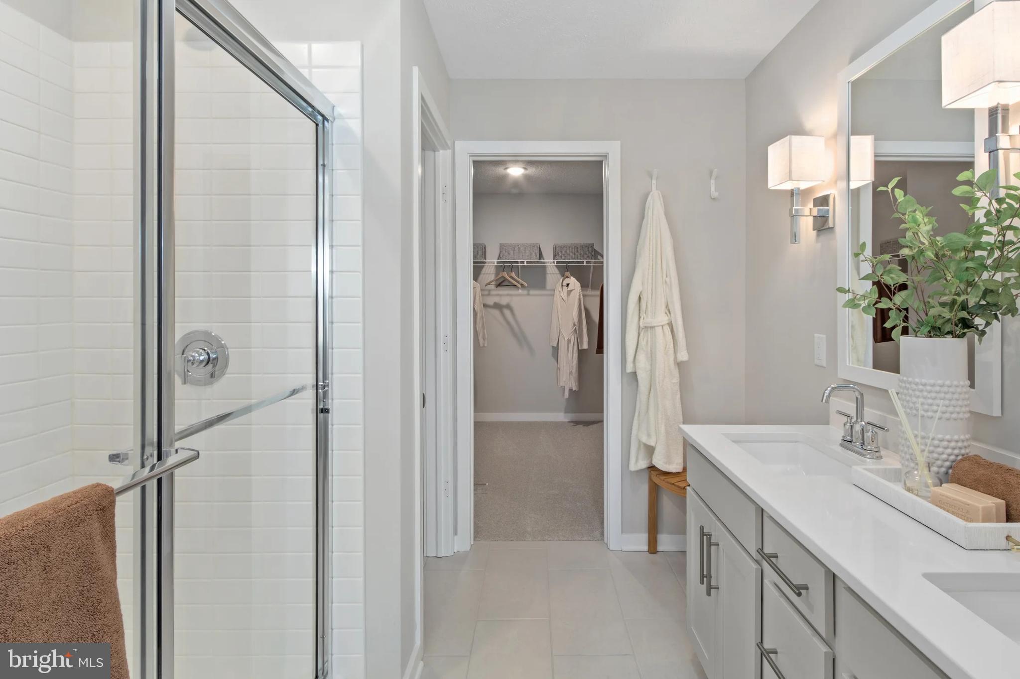 94 Thornton Avenue Ranson, WV 25438 - Photo 15 of 24 a bathroom with a sink and mirror