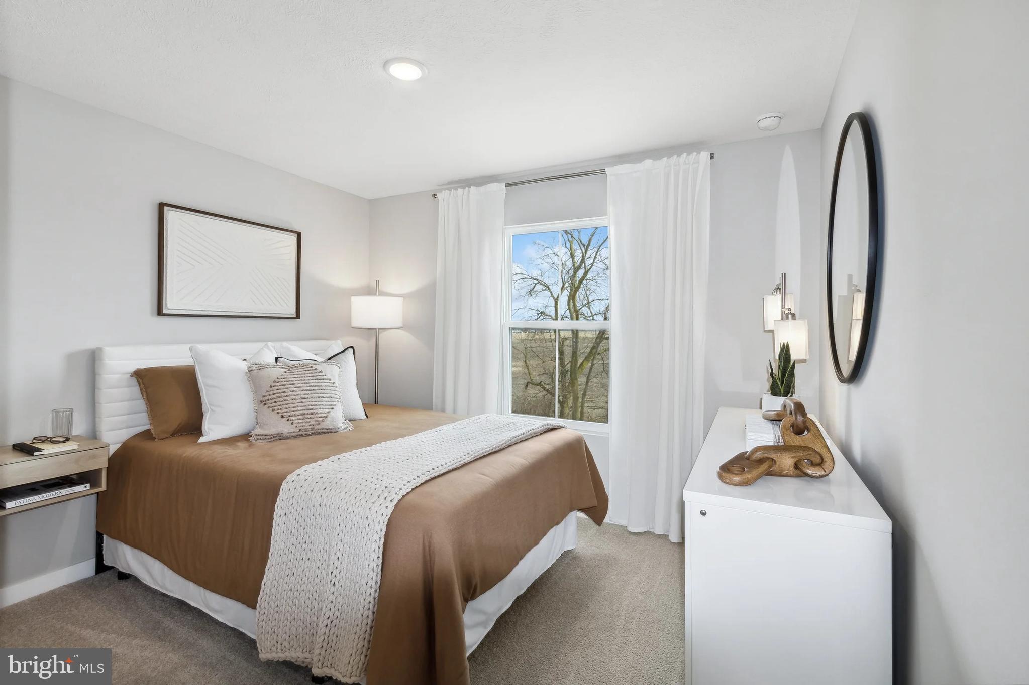 94 Thornton Avenue Ranson, WV 25438 - Photo 19 of 24 a bedroom with a bed and a window