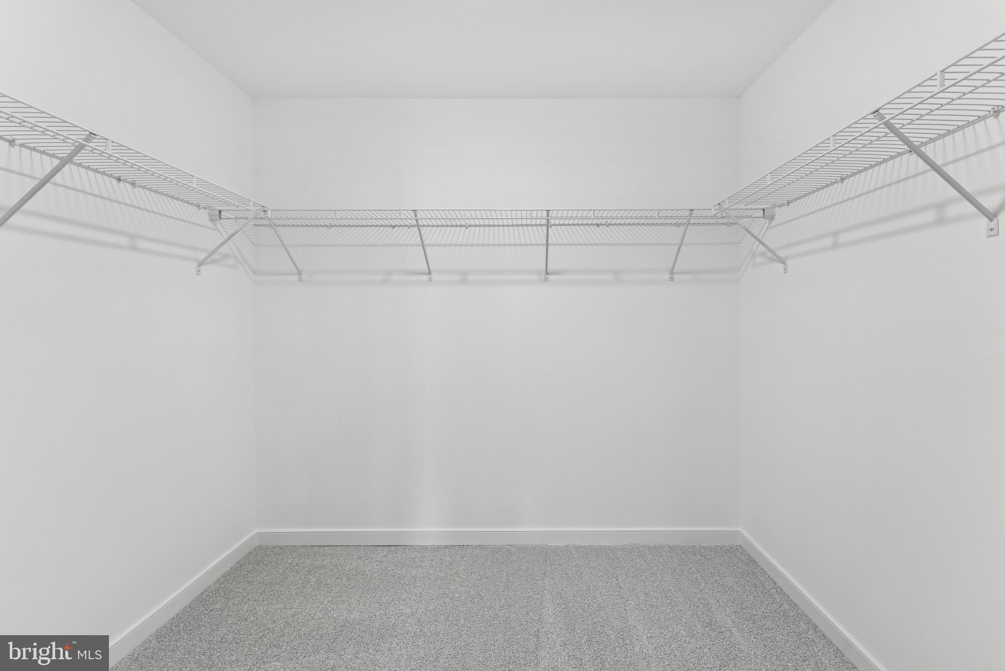 94 Thornton Avenue Ranson, WV 25438 - Photo 21 of 22 a view of a room with racks on the wall