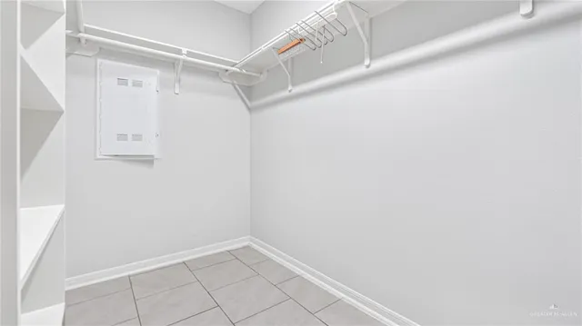 a bathroom with a granite countertop sink shower and a mirror