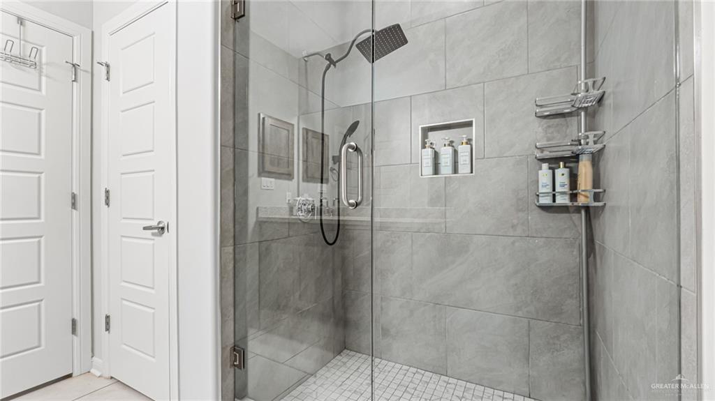 14208 Boykin Creek Road McAllen, TX 78504 - Photo 24 of 30 a bathroom with a shower