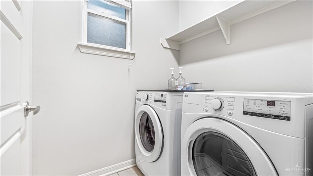 14208 Boykin Creek Road McAllen, TX 78504 - Photo 10 of 30 a utility room with dryer and washer