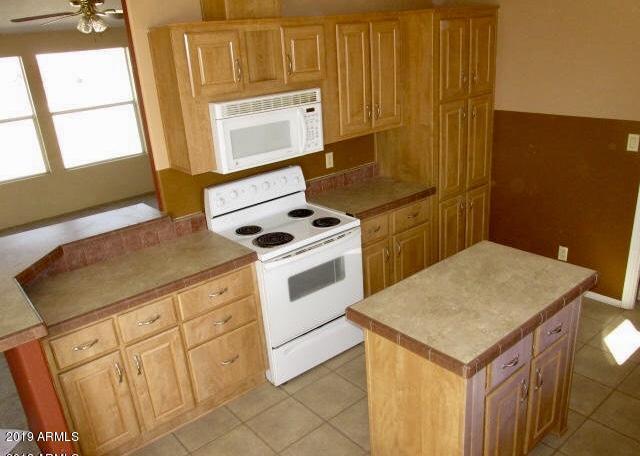 14512 South Tuthill Road Buckeye, AZ 85326 - Photo 15 of 26 CF25A692-5B34-417B-9BD1-293C7266EC33