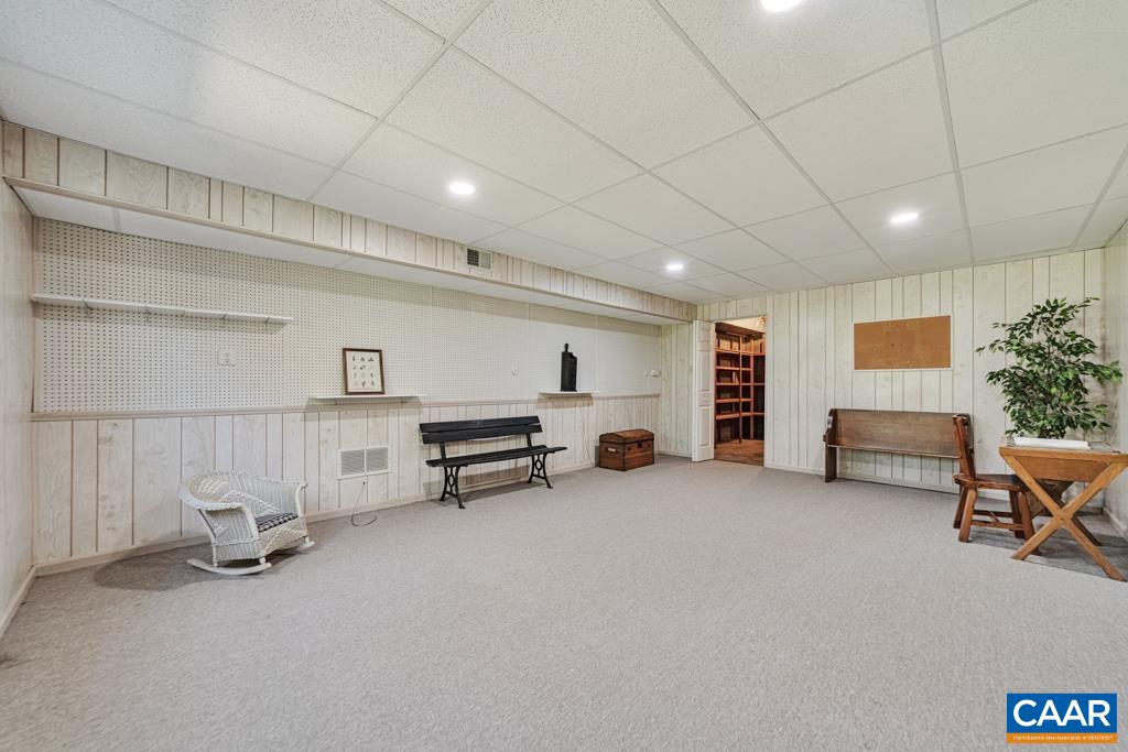 304 Club Road Louisa, VA 23093 - Photo 42 of 55 Pool table? Exercise equipment? The door in the back goes to a HUGE storage room.