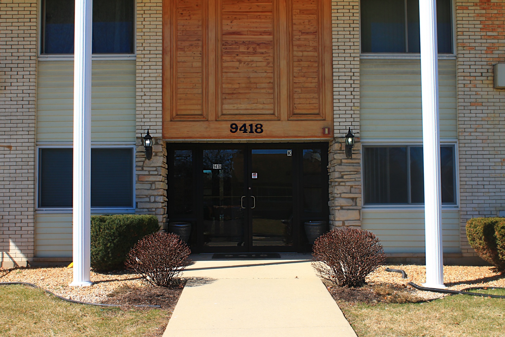 9418 Dee Road, Unit 2B Des Plaines, IL 60016 - Photo 2 of 21 a front view of a house