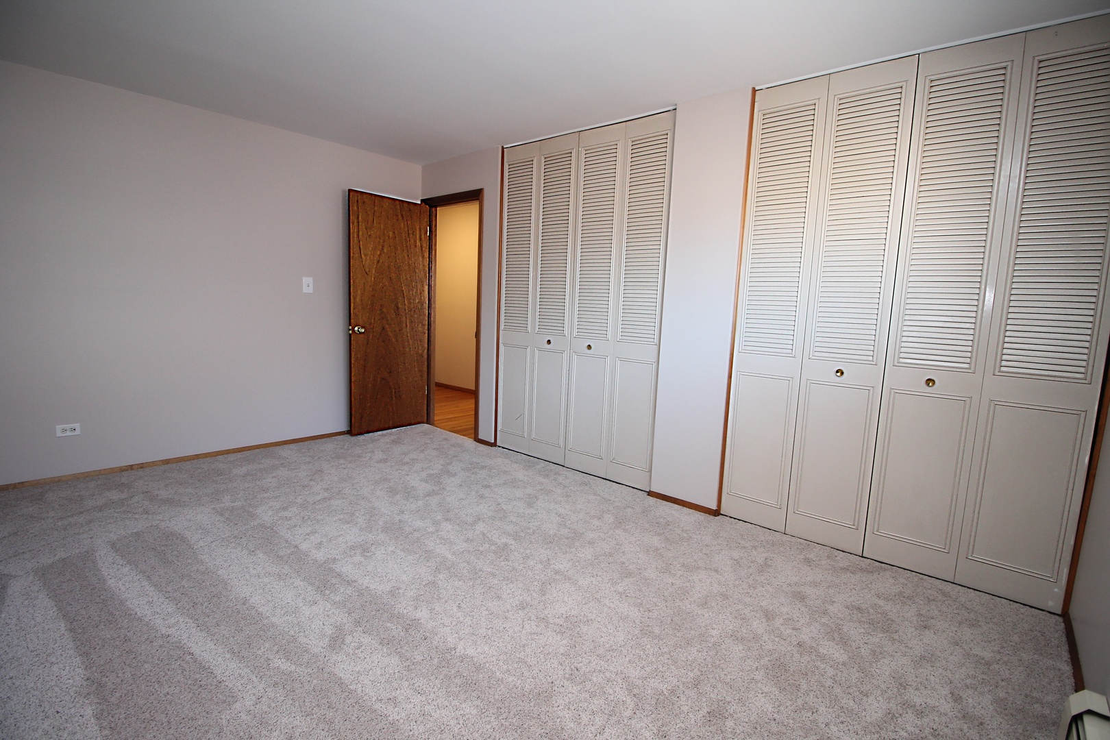 9418 Dee Road, Unit 2B Des Plaines, IL 60016 - Photo 11 of 21 a view of an empty room with closet area