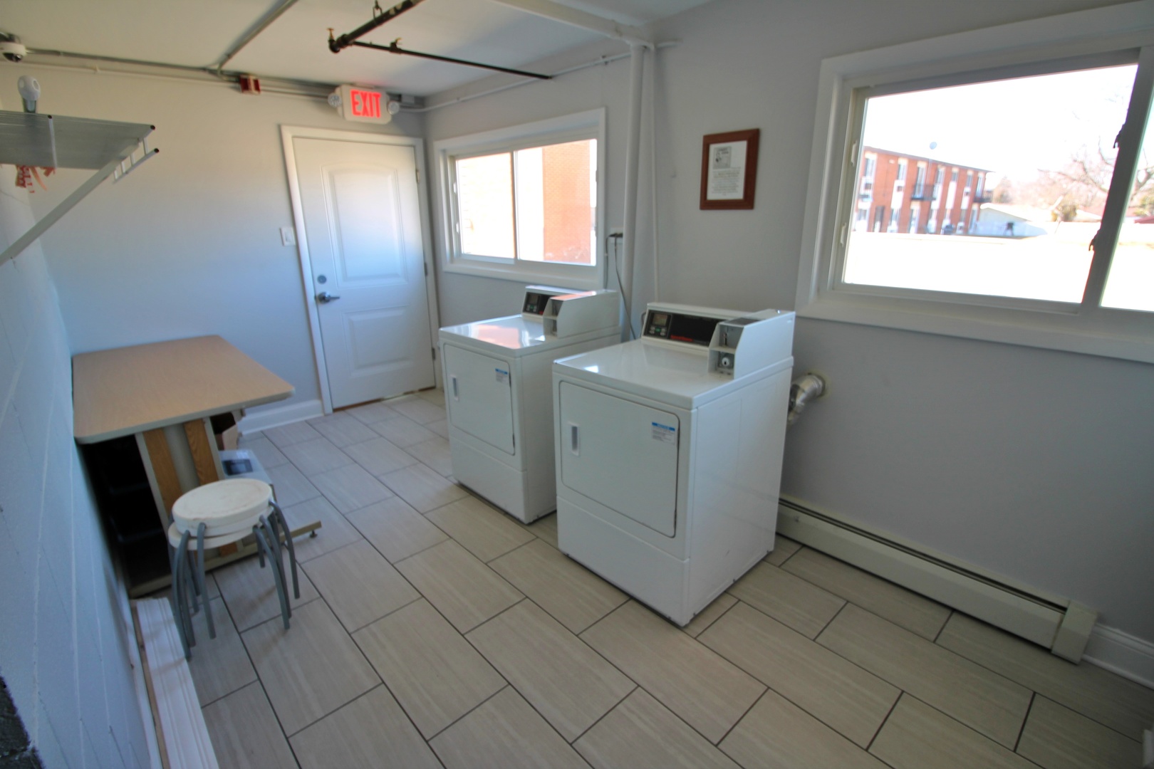 9418 Dee Road, Unit 2B Des Plaines, IL 60016 - Photo 17 of 21 a utility room with dryer and washer