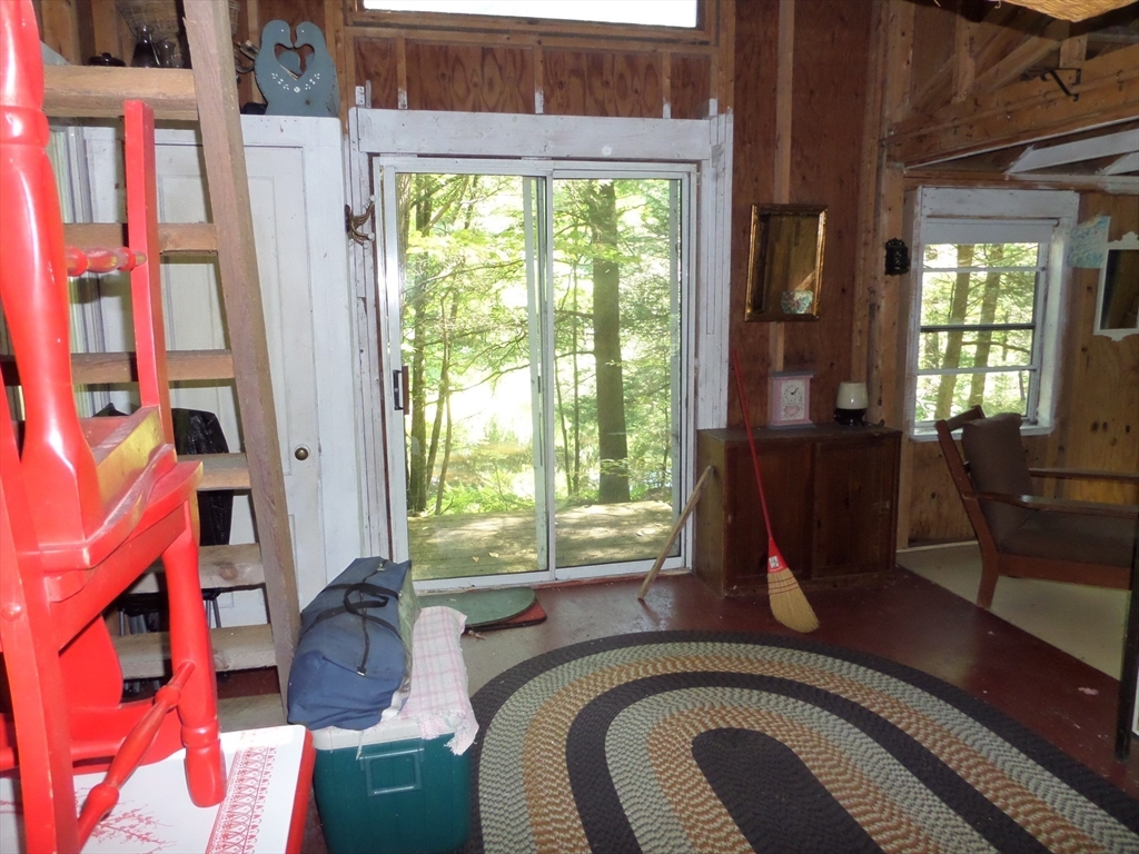 155 River Road Worthington, MA 01098 - Photo 13 of 29 a living room with furniture and a window