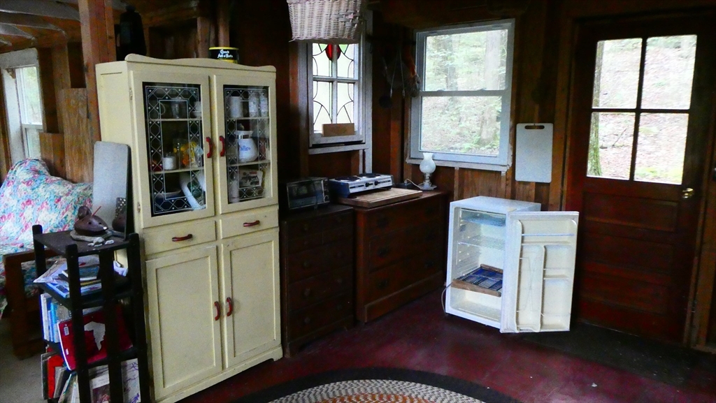 155 River Road Worthington, MA 01098 - Photo 26 of 29 a kitchen with stainless steel appliances granite countertop a stove a sink and a refrigerator