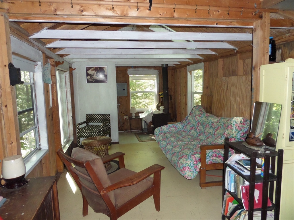 155 River Road Worthington, MA 01098 - Photo 8 of 29 a living room with furniture and a flat screen tv