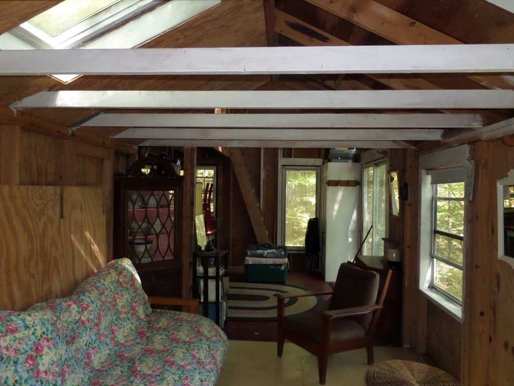 155 River Road Worthington, MA 01098 - Photo 10 of 29 a living room with furniture and a window