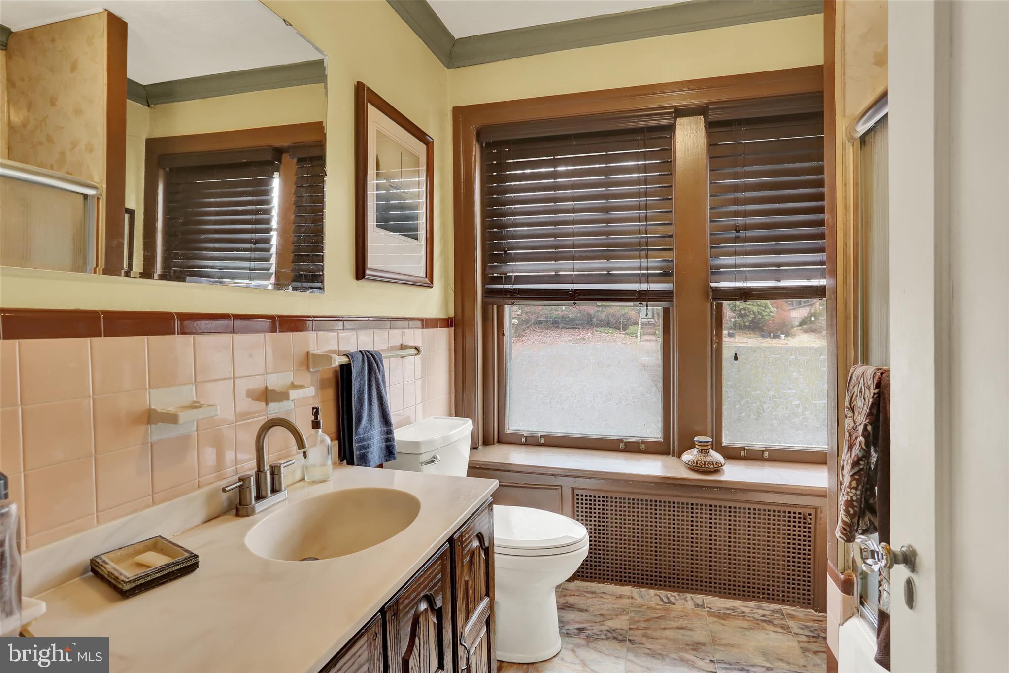 1810 Holly Road Reading, PA 19602 - Photo 27 of 52 a bathroom with a sink and a toilet