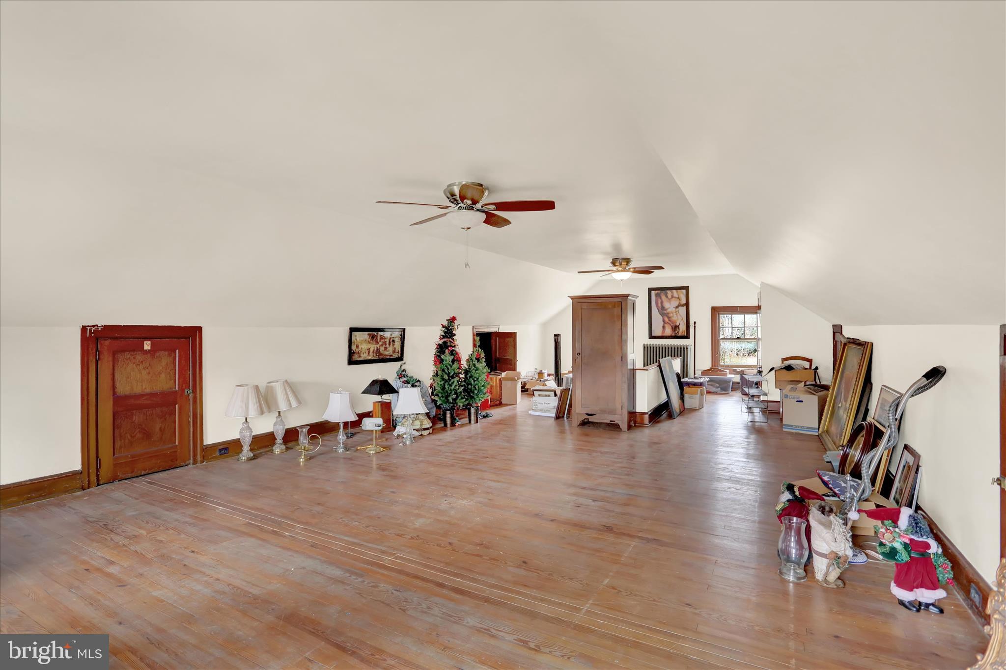 1810 Holly Road Reading, PA 19602 - Photo 43 of 52 a living room with furniture and a wooden floor
