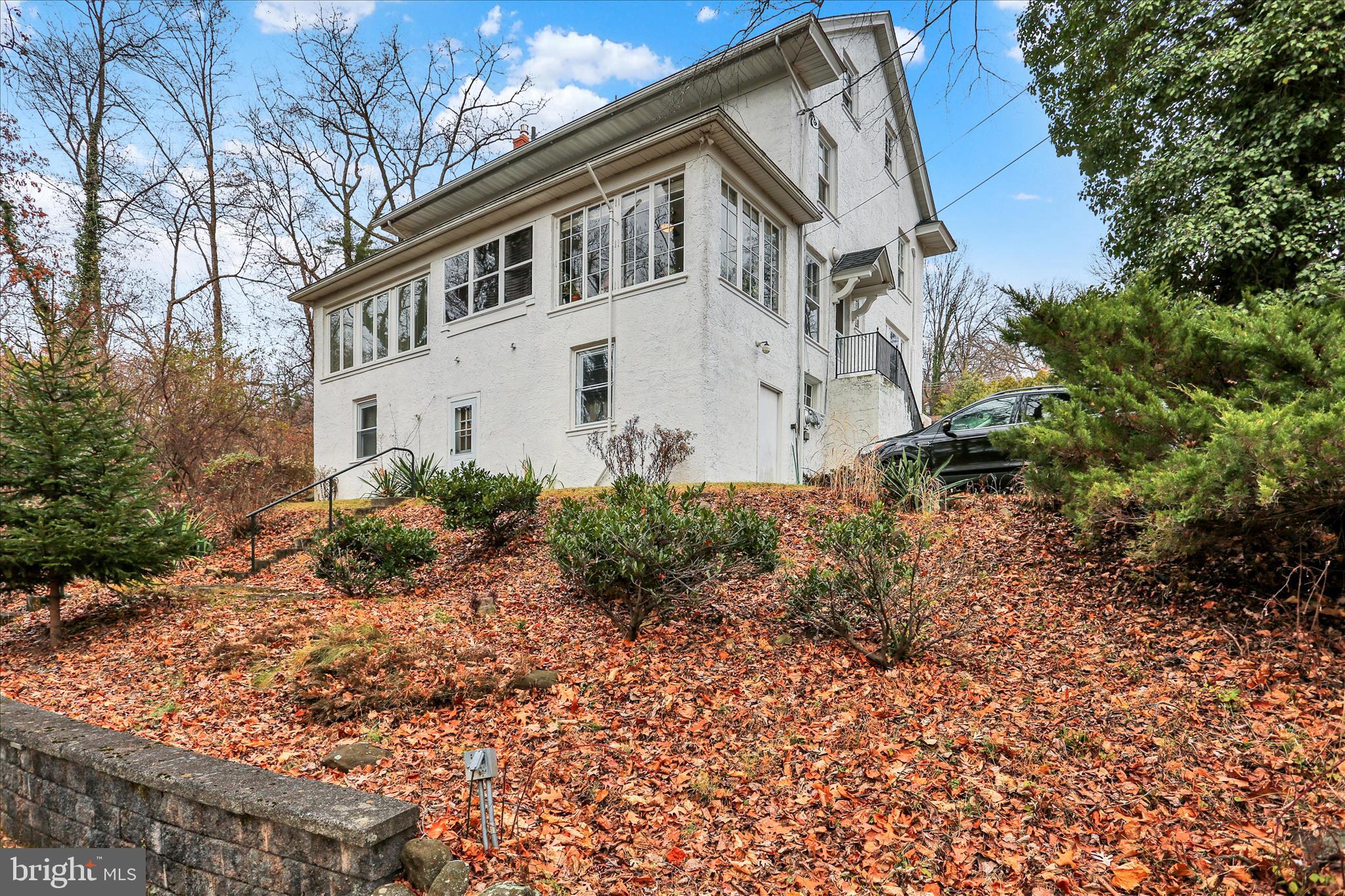 1810 Holly Road Reading, PA 19602 - Photo 49 of 52 a white house that has a tree in front of it