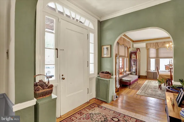 a view of a livingroom with furniture and windows