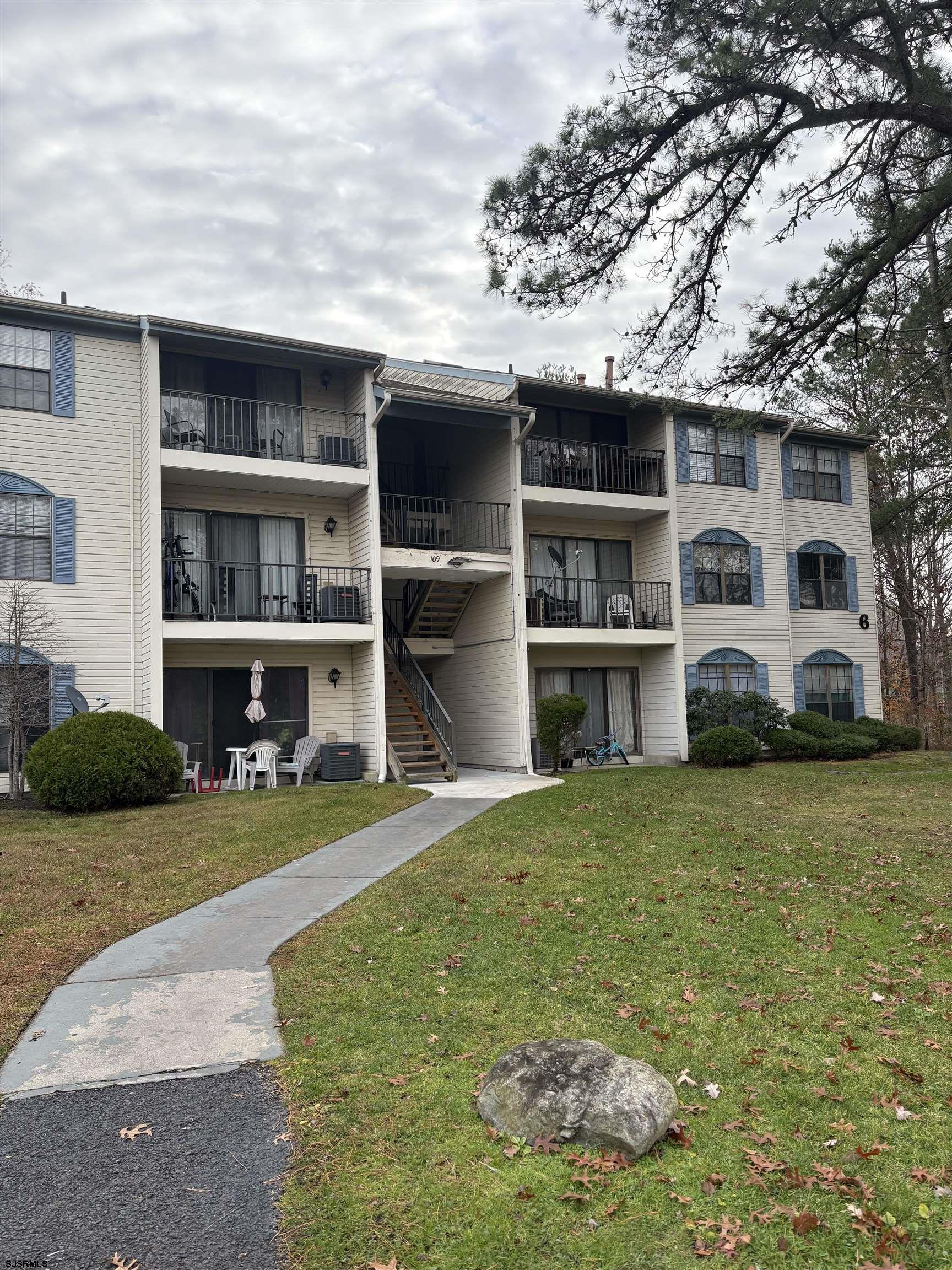 113 Federal, Unit 113 Galloway Township, NJ 08205 - Photo 1 of 13 a front view of house with yard
