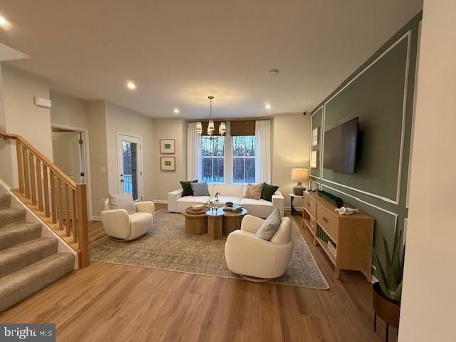 10150 Queens Way Manassas, VA 20110 - Photo 13 of 77 a living room with furniture and a flat screen tv