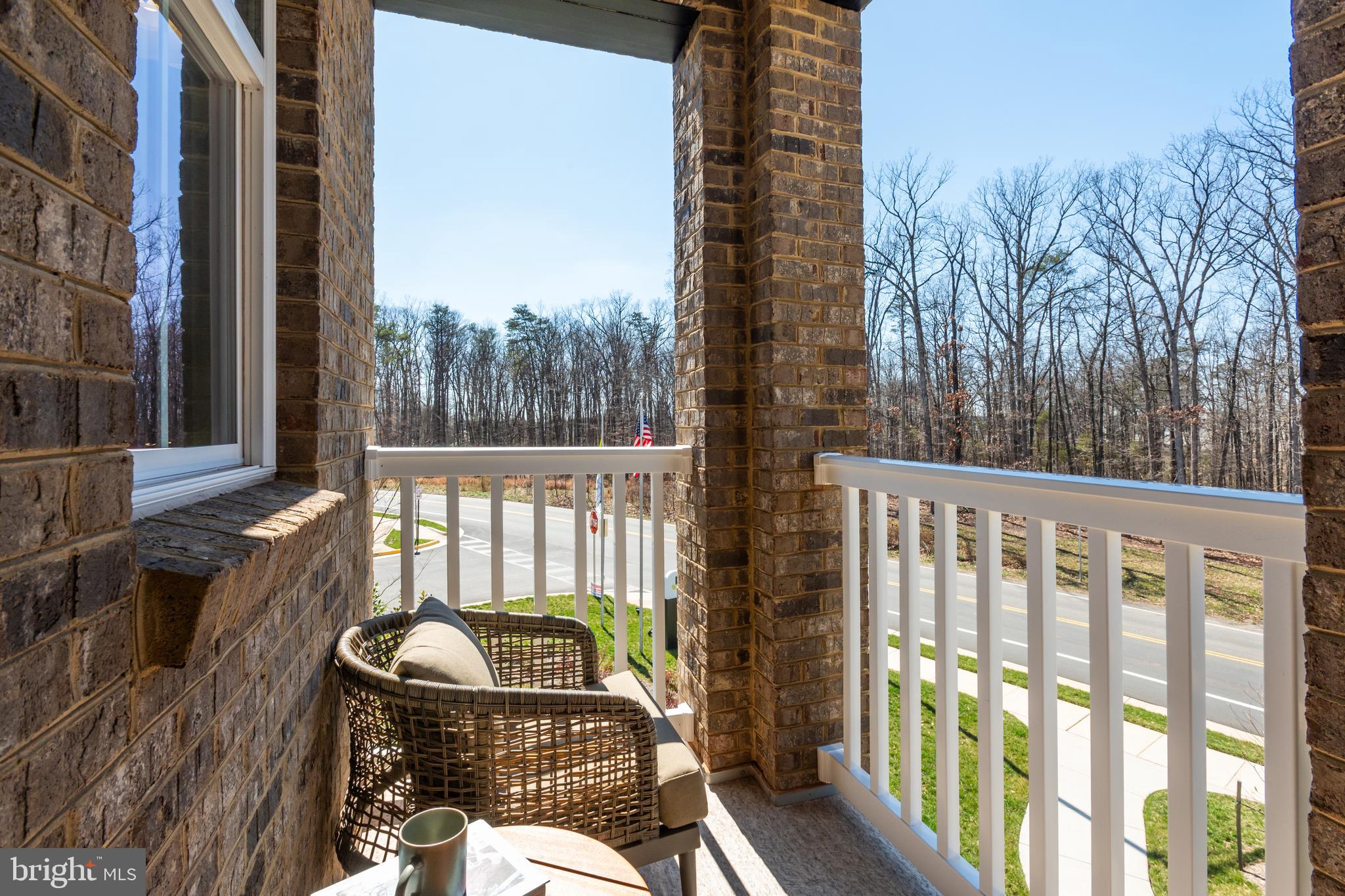 10150 Queens Way Manassas, VA 20110 - Photo 50 of 77 a view of a balcony with wooden floor