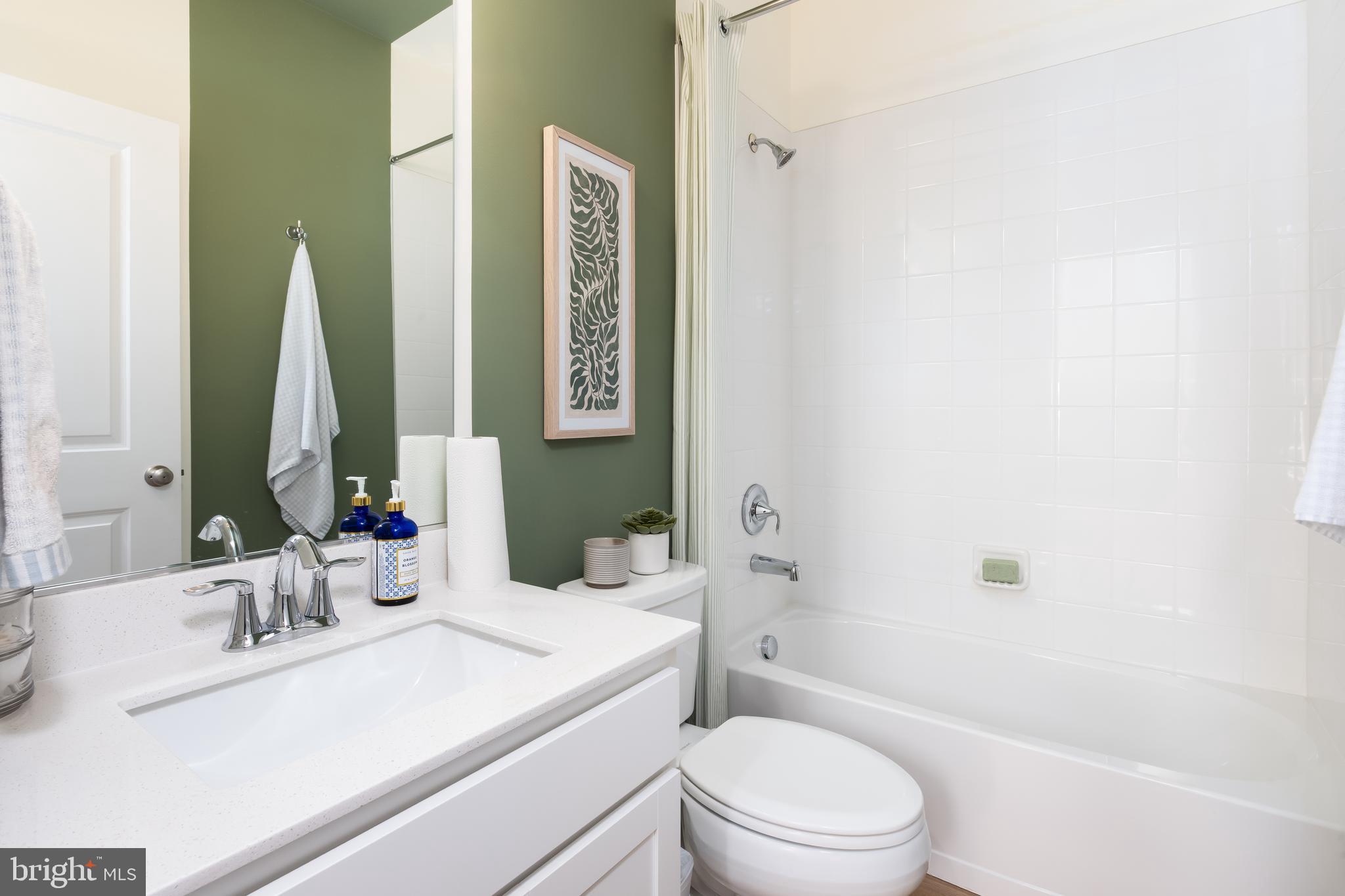 10150 Queens Way Manassas, VA 20110 - Photo 77 of 77 a bathroom with a sink a toilet and shower