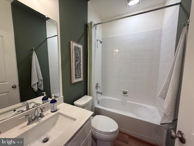 10150 Queens Way Manassas, VA 20110 - Photo 8 of 77 a bathroom with a bathtub shower sink vanity mirror and toilet