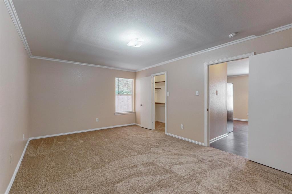 4827 Mexico Dallas, TX 75236 - Photo 15 of 31 an empty room with windows and closet