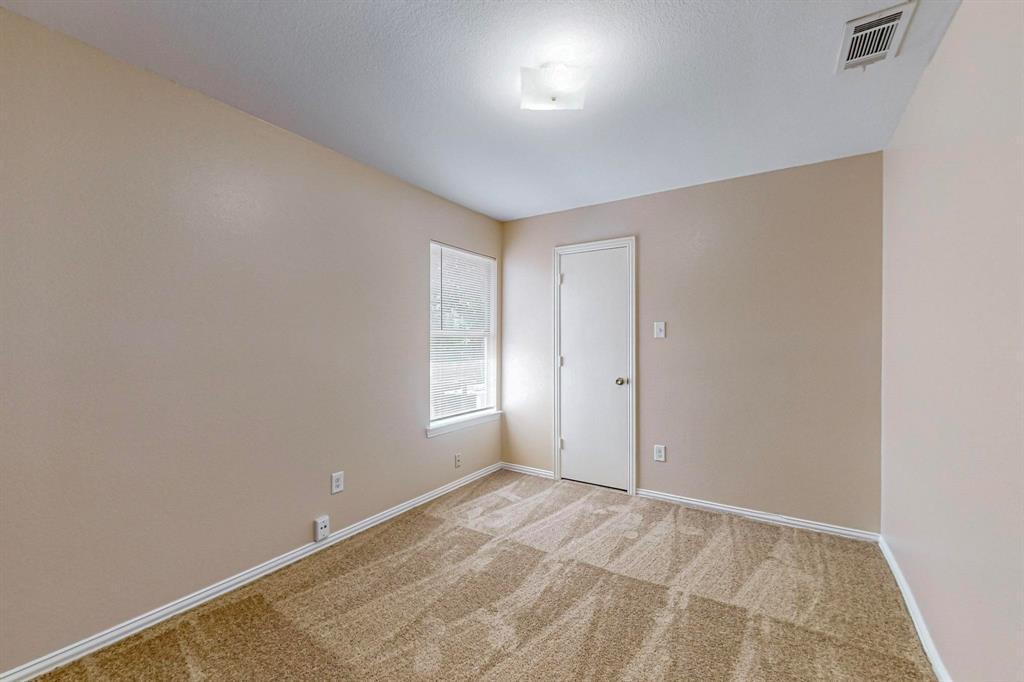 4827 Mexico Dallas, TX 75236 - Photo 24 of 31 an empty room with a empty space and windows