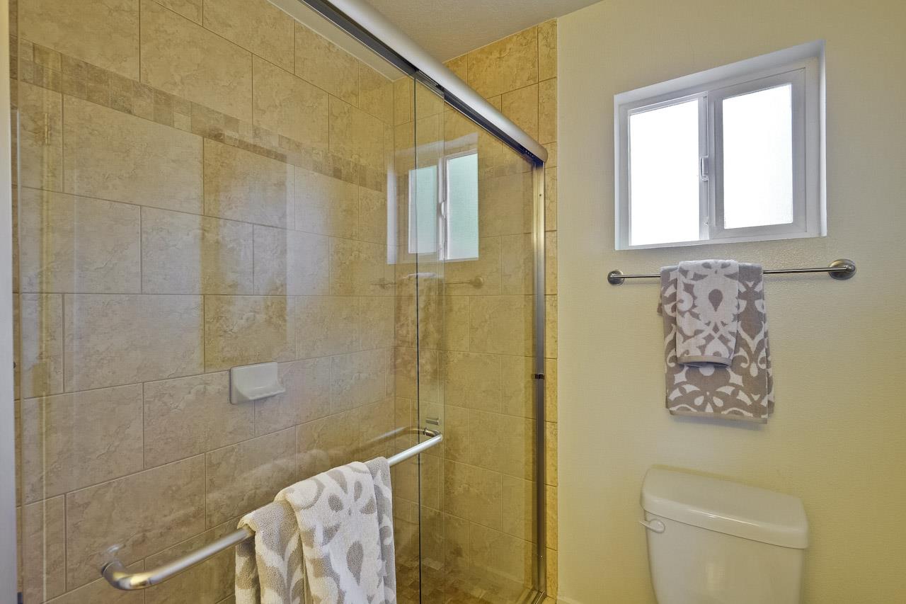 2002 West Middlefield Road, Unit 5 Mountain View, CA 94043 - Photo 16 of 24 a bathroom with a shower and a toilet