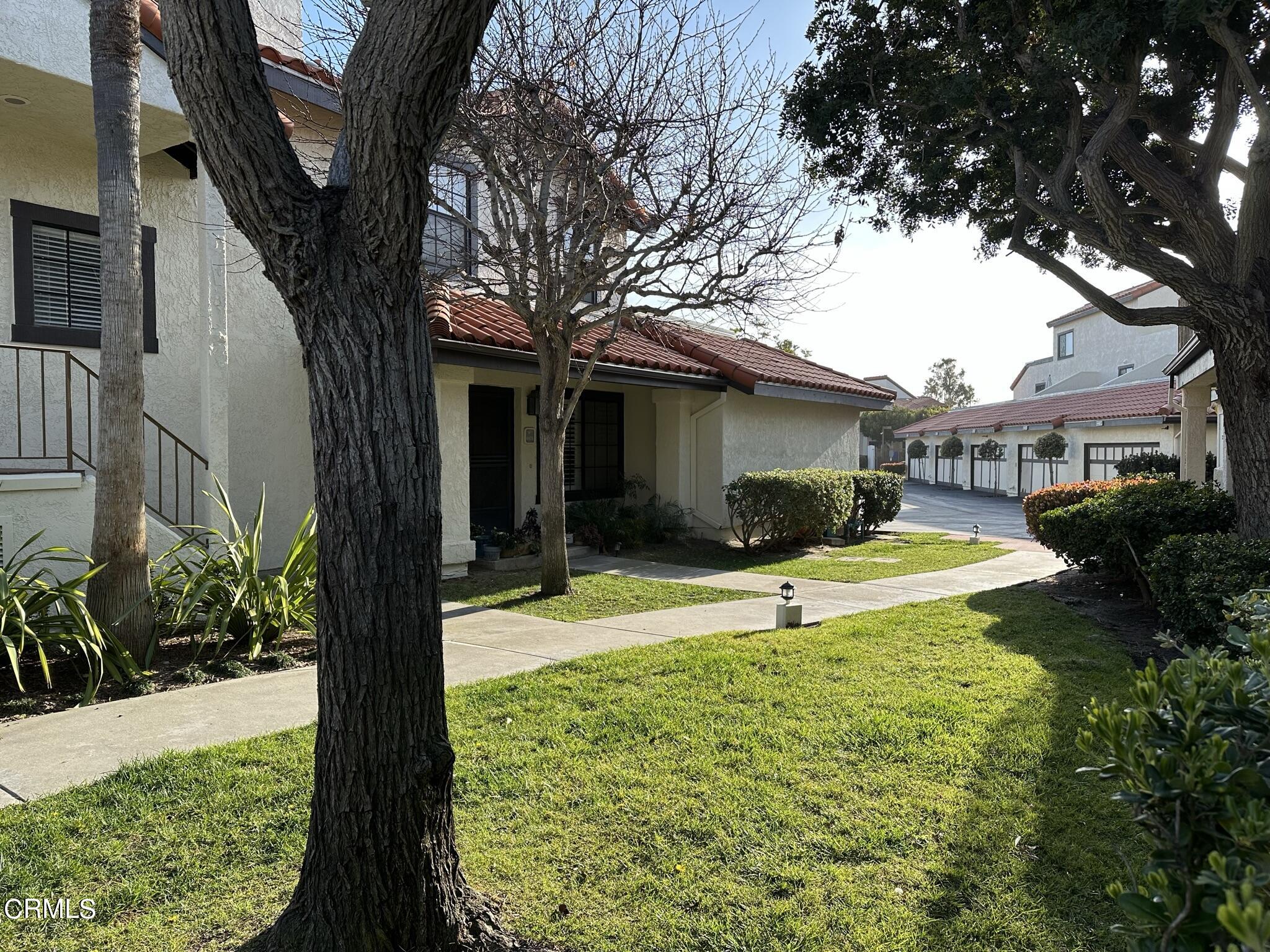 4475 Antigua Way Oxnard, CA 93035 - Photo 16 of 31 a view of a house with swimming pool and sitting area