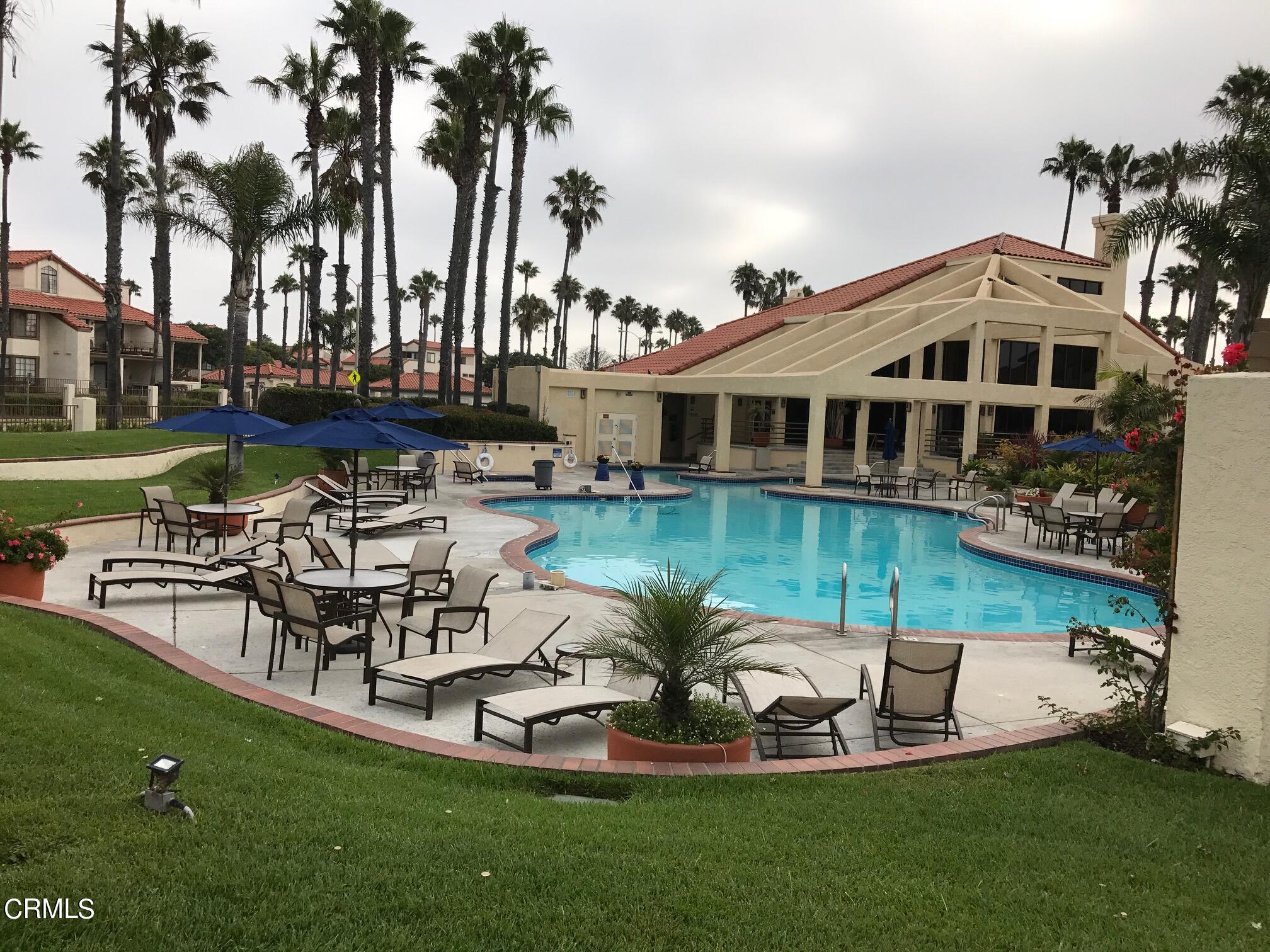 4475 Antigua Way Oxnard, CA 93035 - Photo 29 of 31 a view of a house with a yard table and chairs