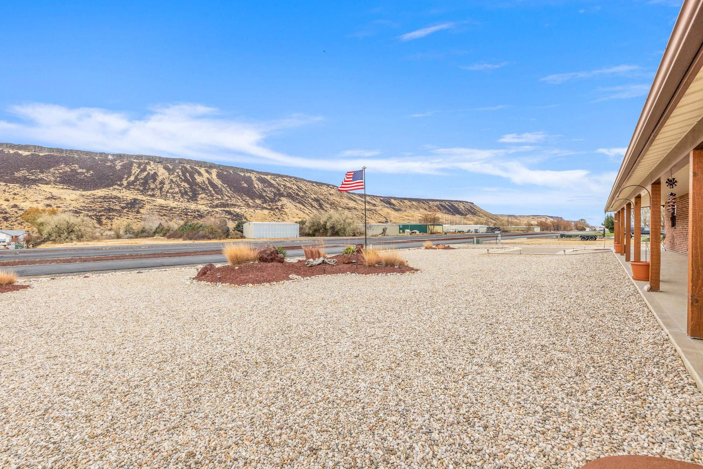 10514 Airpark Loop Road Melba, ID 83641 - Photo 2 of 48 View of yard featuring a mountain view