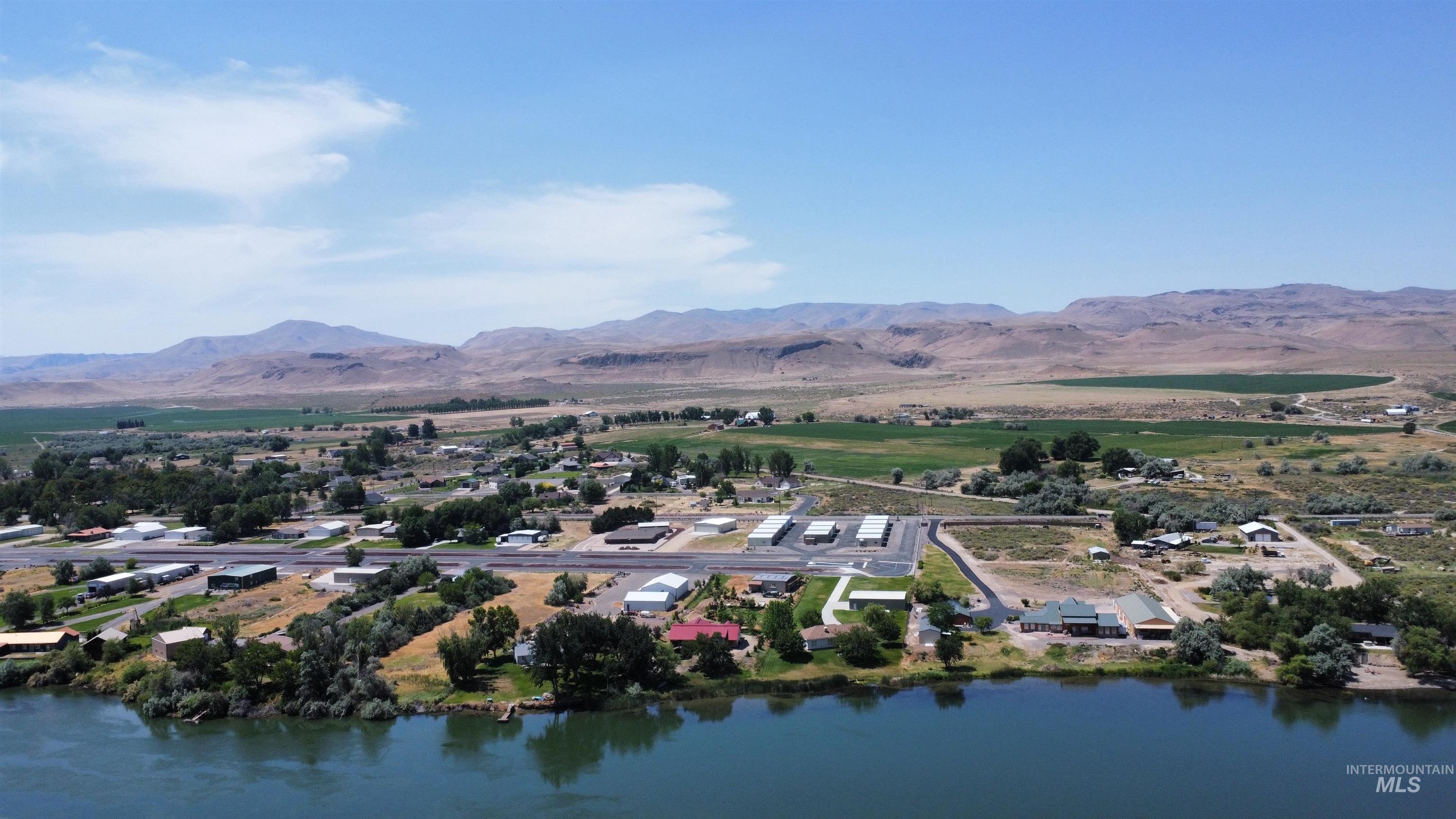 10514 Airpark Loop Road Melba, ID 83641 - Photo 44 of 48 Drone / aerial view of a water and mountain view