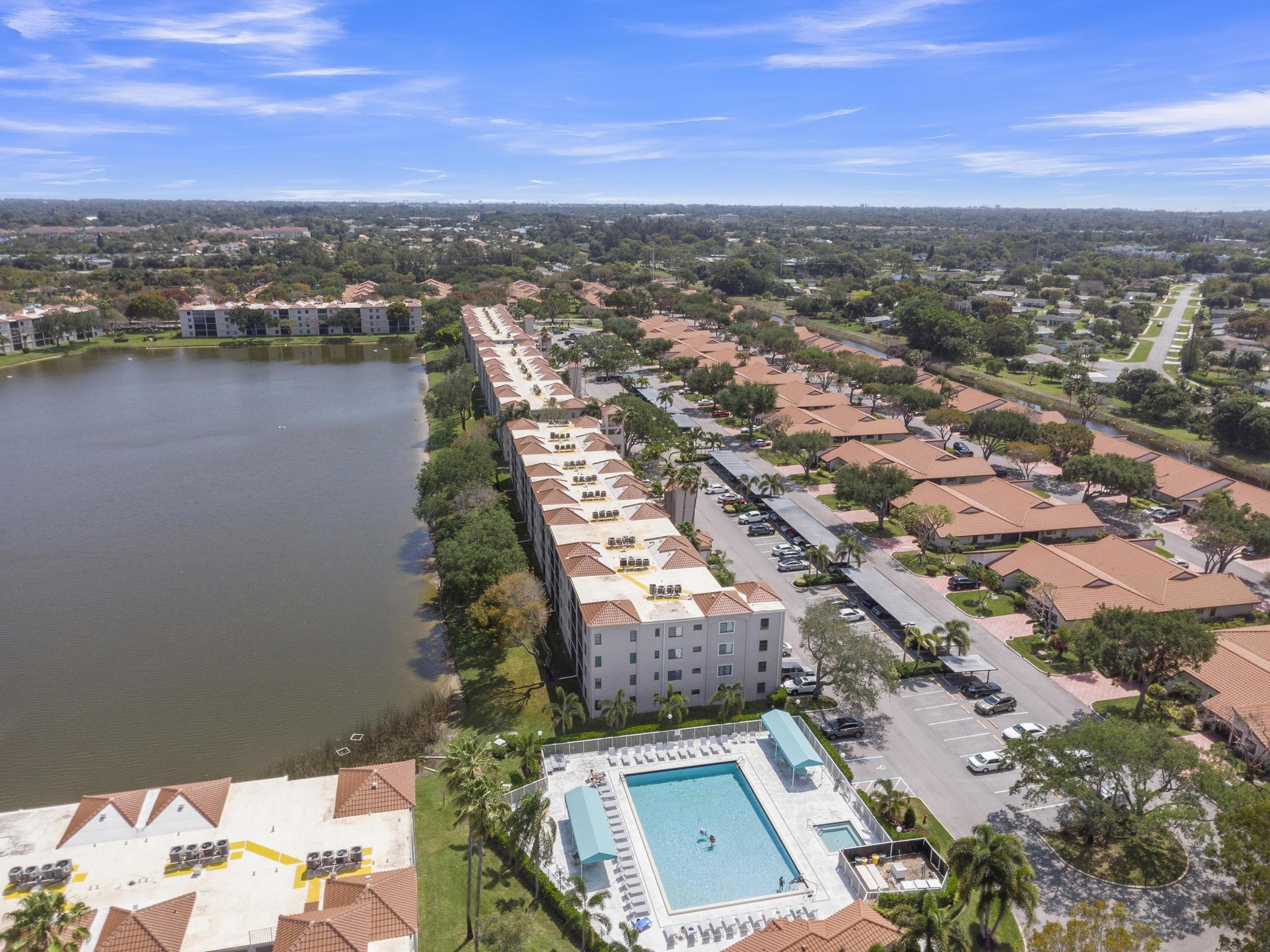 6241 Pointe Regal Circle, Unit 402 Delray Beach, FL 33484 - Photo 22 of 23 an aerial view of residential building with outdoor space