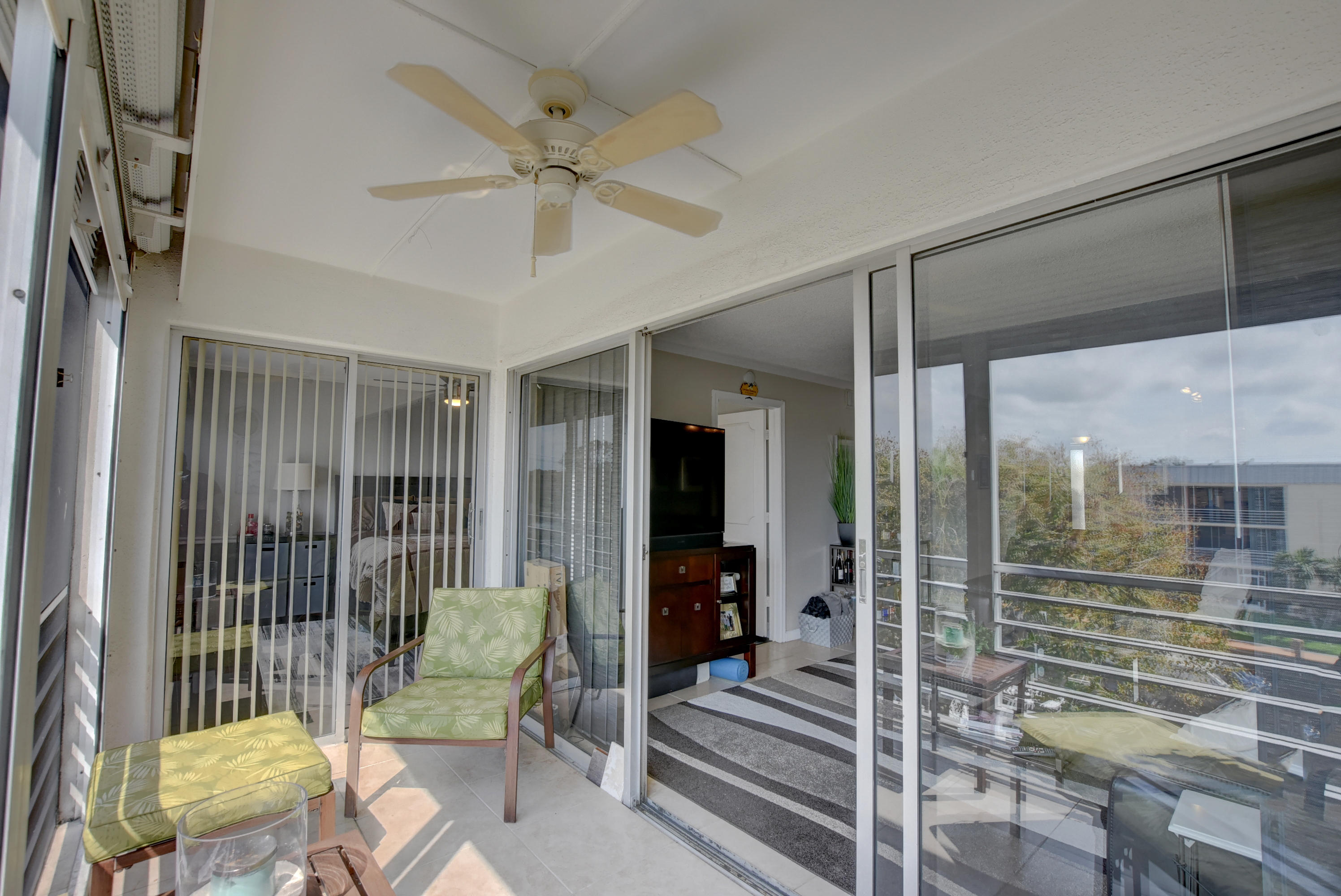 765 Jeffery Street, Unit 1306 Boca Raton, FL 33487 - Photo 19 of 34 a view of a livingroom with furniture and windows