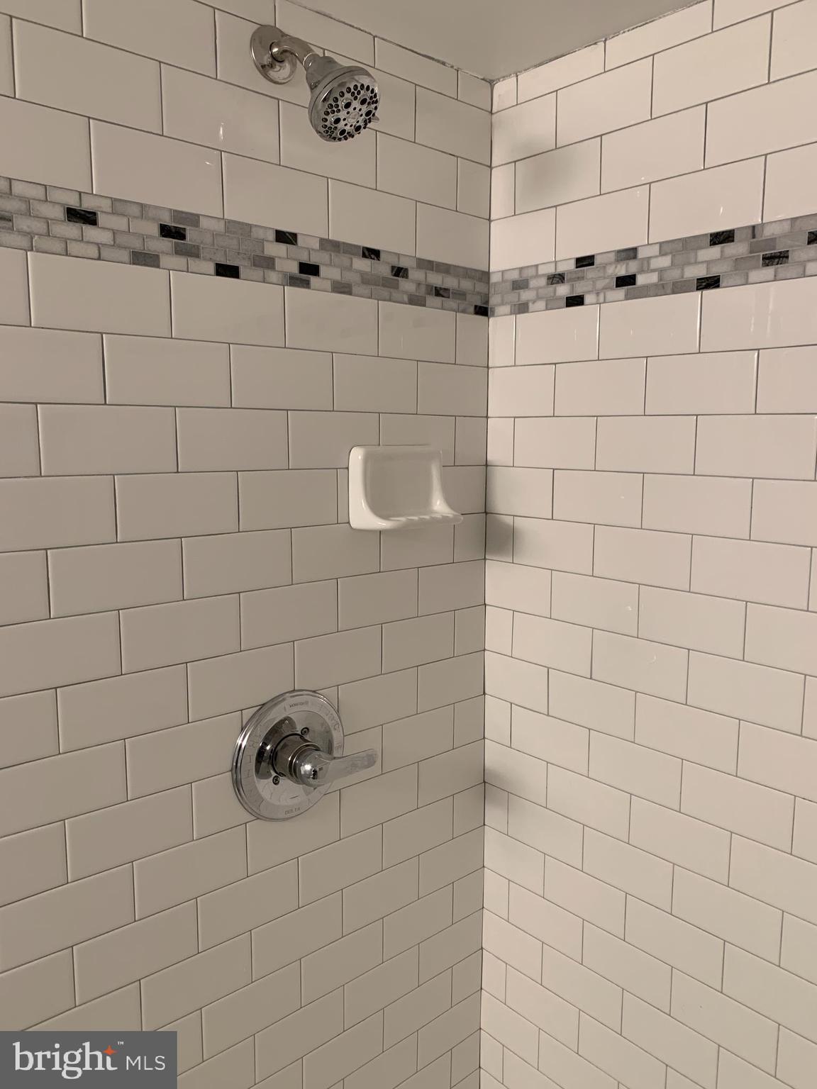 4429 Newport Avenue Baltimore, MD 21211 - Photo 14 of 17 a bathroom with a shower